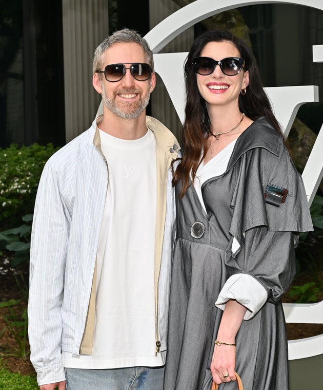 Adam Shulman and Anne Hathaway pictured in May 2026