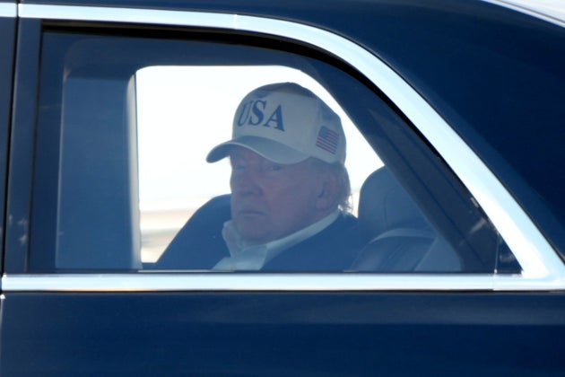 President Donald Trump sits in his limousine, known as The Beast, after arriving on Marine One at Joint Base Andrews, Md., Sunday, June 21, 2026, following a trip to Camp David. 