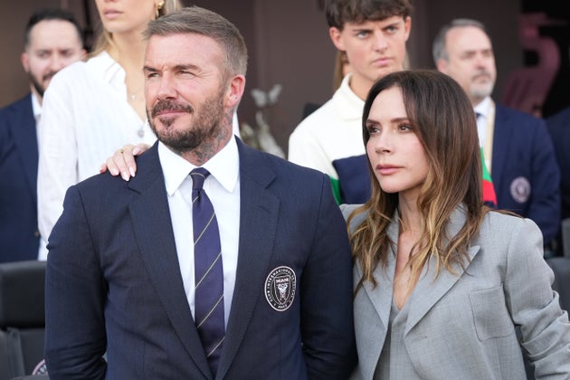 Sir David and Victoria Beckham pictured in December 2025