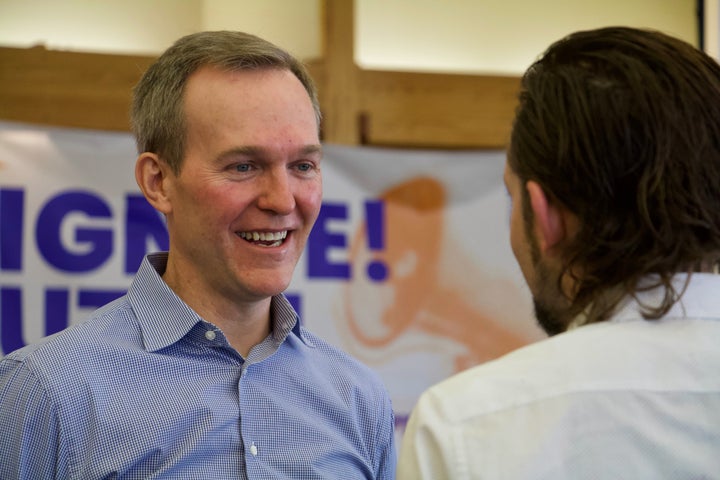 Former U.S. Rep. Ben McAdams speaks to a voter at an event for candidates running to represent Utah's new Democratic-leaning congressional district on March 21, 2026, in Taylorsville, Utah. (AP Photo/Hannah Schoenbaum)