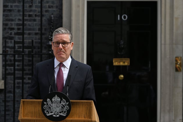 Britain's Prime Minister Keir Starmer speaks to the media outside 10 Downing Street to announce his resignation in London, Monday, June 22, 2026. (AP Photo/Thomas Krych)