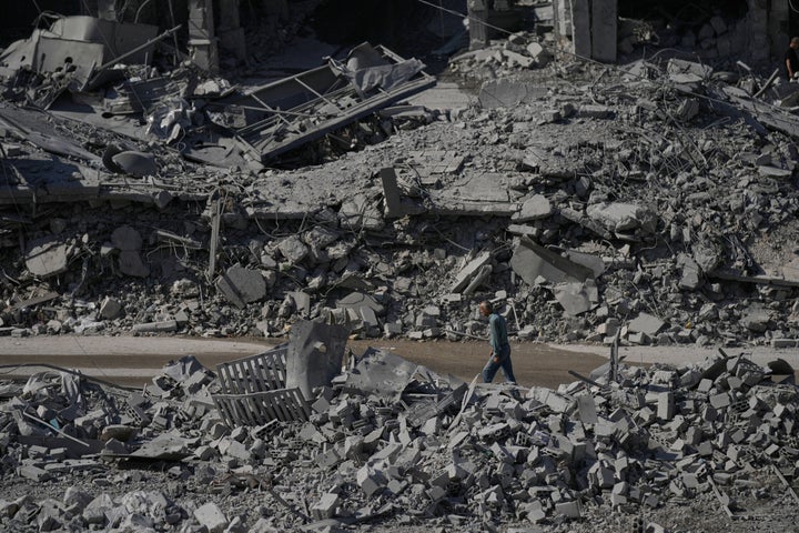 A man walks past the rubble of buildings destroyed in previous Israeli airstrikes in the town of Nabatiyeh, southern Lebanon, on June 24, 2026, after a ceasefire between Israel and Hezbollah.
