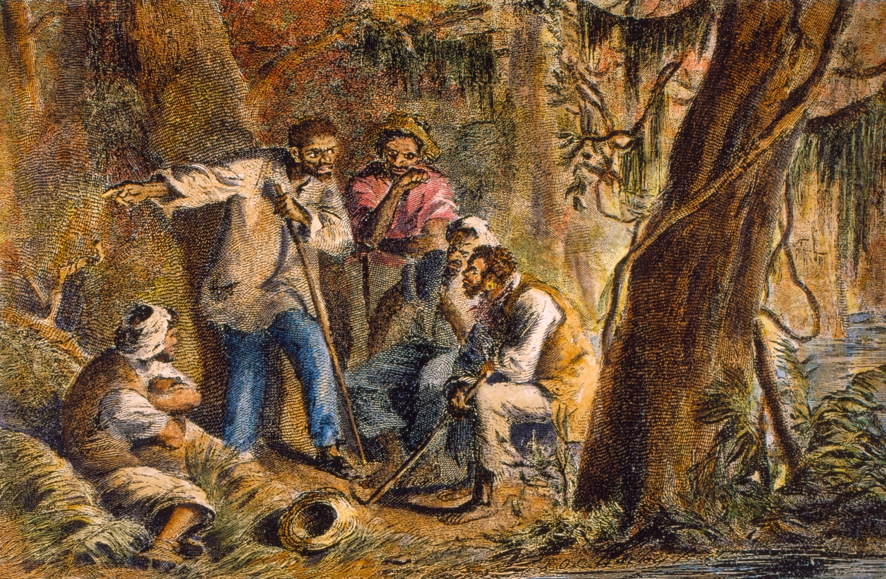 American slave leader Nat Turner and his companions are shown in a wooded area, 1831. Turner led an uprising of slaves that resulted in the death of more than 50 white people. He was tried, convicted and hanged in the state of Virginia.