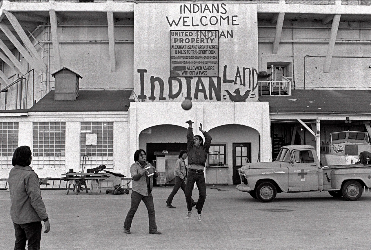 Native Americans play ball at the main dock during their occupation of Alcatraz Island in San Francisco Bay, California, on Nov. 26, 1969.