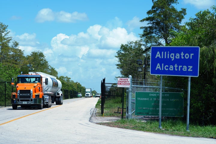 Trucks come and go from the "Alligator Alcatraz" immigration detention center in the Florida Everglades in August 2025.