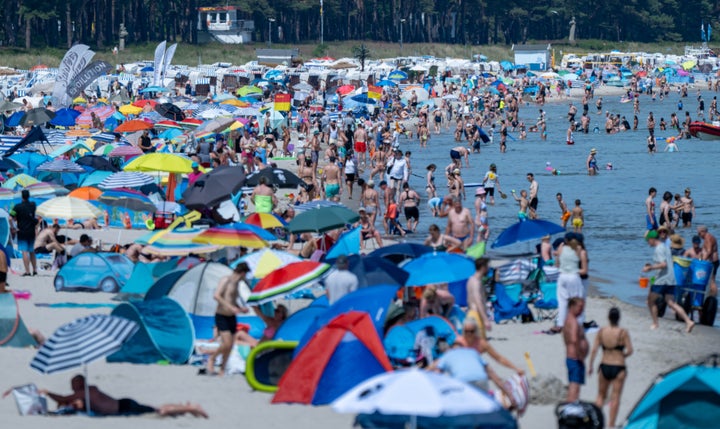 The weather is sunny on the beach at the seaside resort on the island of Rügen. Photo: Stefan Sauer/dpa (Photo by Stefan Sauer/picture alliance via Getty Images)