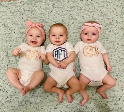 The Fathauer triplets at the family’s home (from left: Frankii, Albert and Charlee)