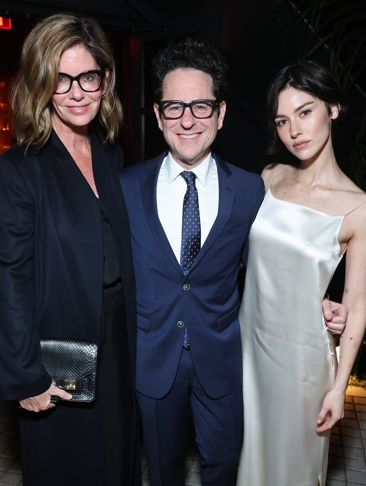 Gracie Abrams pictured with her parents, PR exec Katie McGrath and director JJ Abrams, in March 2026