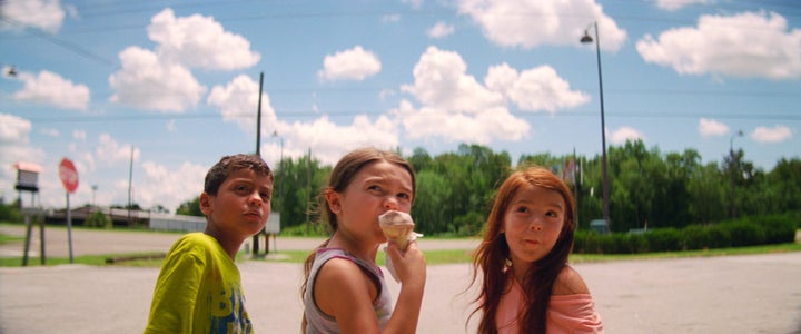 Christopher Rivera, Brooklynn Prince and Valeria Cotto in "The Florida Project."