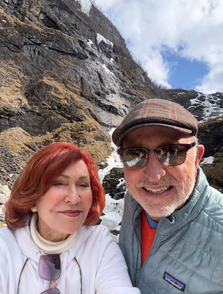 The author and Bob sailing on a catamaran through Sognefjord, Norway's largest and one of its most breathtaking fjords.