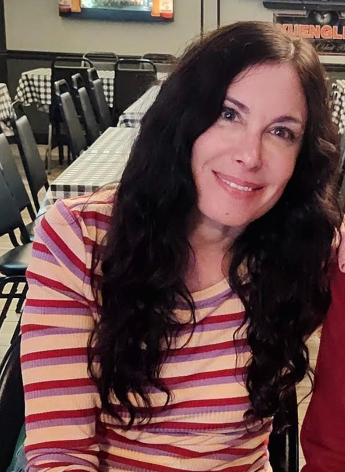 "This is a random shot of me out enjoying my life," the author writes. "I'm trying to get back to that as I adjust to this phase of my life."