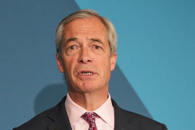 Nigel Farage, leader of the Reform UK party, listens a press conference in London, Monday, April 13, 2026. (AP Photo/Kirsty Wigglesworth)