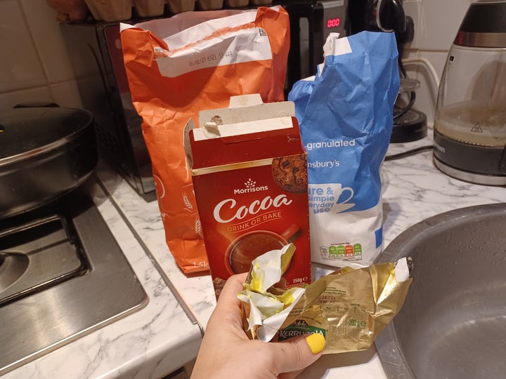 Cocoa, plain flour, butter, and sugar: four of the five ingredients needed for kladdkaka