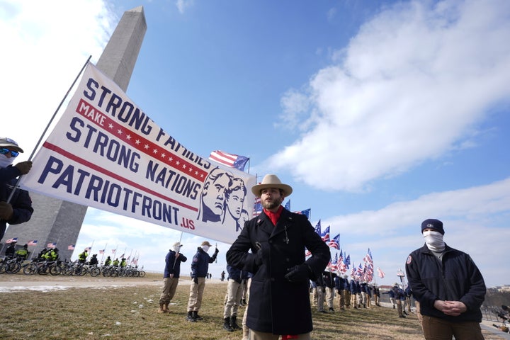 Thomas Rousseau, center, and members of a group calling themselves Patriot Front rally near the Washington Monument on Jan. 24, 2025, in Washington, D.C.
