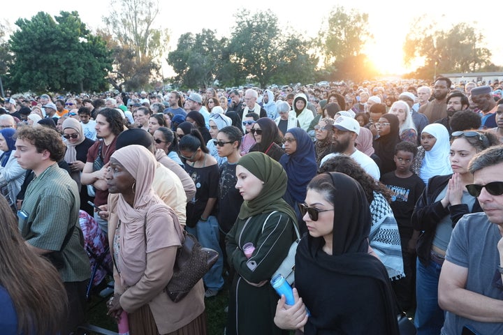Hundreds of community members gather at Lindbergh Park beside the Islamic Center of San Diego during a vigil following the deadly mosque shooting in San Diego, California, United States, on May 19, 2026.