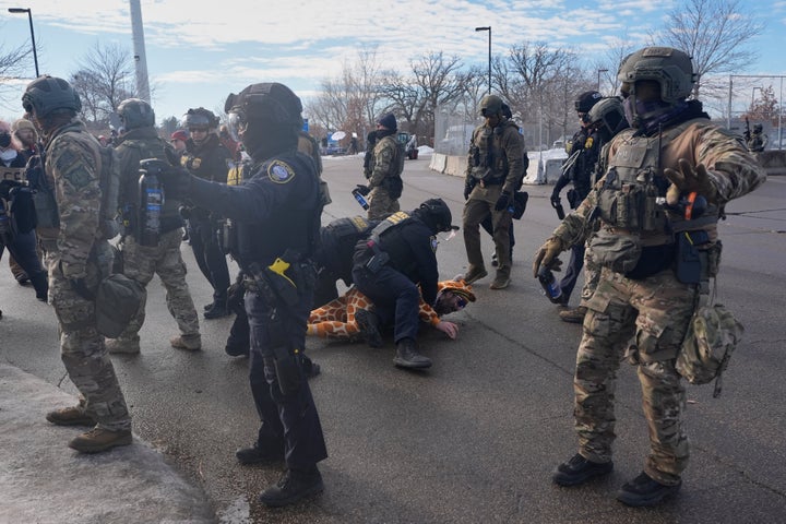 Protesters demonstrate against the U.S. Immigration and Customs Enforcement agency in the aftermath of the fatal shooting of Renee Good by an ICE officer on Jan. 12, 2026, in Minneapolis.