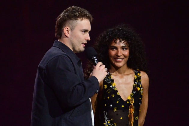 Sam Fender and Olivia Dean on stage at the Brit Awards earlier this year