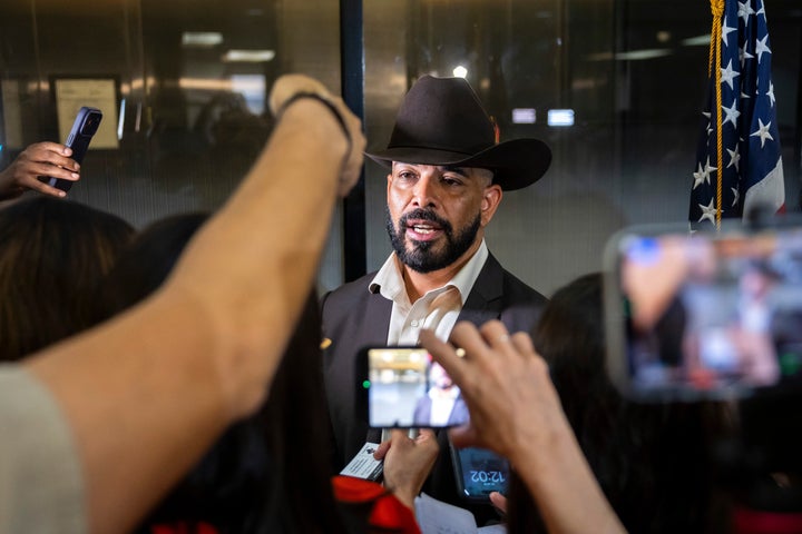 Attorney Hugo Balderas-Ibarra speaks to reporters after a press briefing in Houston on Friday. Balderas-Ibarra is representing two of the other passengers who were in the car when an Immigration and Customs Enforcement officer shot and killed Lorenzo Salgado Araujo.