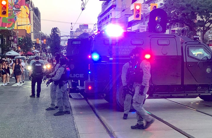 Emergency Task Force vehicles and police officers are seen at the scene of a shooting in Toronto, Canada, on July 11, 2026. (Photo: Jorge UZON / AFP via Getty Images)