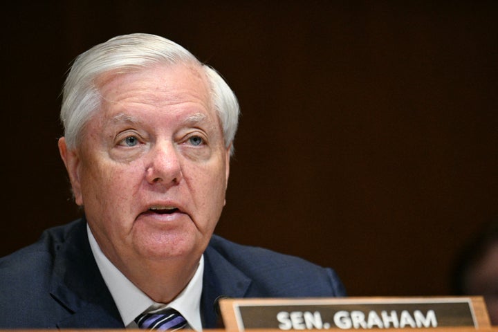 U.S. Senator Lindsey Graham, Republican of South Carolina questions U.S. Secretary of Defense Pete Hegseth and Chairman of the Joint Chiefs of Staff General Dan Caine during a Senate Committee on Appropriations, Subcommittee on Defense hearing to examine the 2027 budget for the Department of Defense on Capitol Hill in Washington, D.C., on May 12, 2026. (Photo by Jim WATSON / AFP via Getty Images)