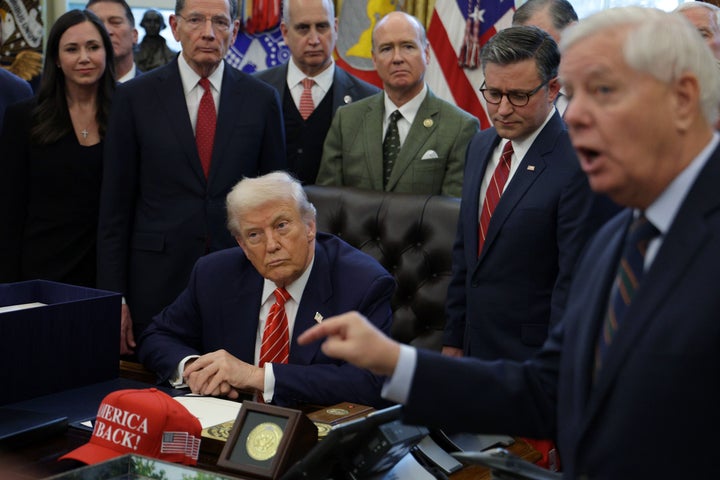 WASHINGTON, DC - FEBRUARY 03: U.S. President Donald Trump listens as U.S. Sen. Lindsey Graham (R-SC) speaks during a bill signing in the Oval Office of the White House on February 03, 2026 in Washington, DC. The House passed legislation today that ends the partial government shutdown while lawmakers negotiate over Immigration and Customs Enforcement policy and funding for the Department of Homeland Security. (Photo by Alex Wong/Getty Images)