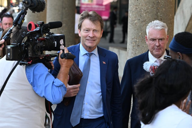 Deputy Leader of Reform UK Richard Tice walks past the media after Reform UK leader Nigel Farage said he'll quit his Parliament seat and seek reelection in London, Tuesday, July 7, 2026.