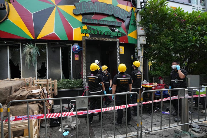 The area was cordoned off Monday morning as dozens of Thai forensic officers combed the charred remains for clues about the cause of the fire.