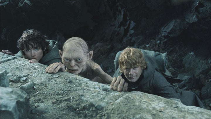 Elijah Wood and Sean Astin In The Lord Of The Rings: The Return Of The King, with Andy Serkis' character Gollum