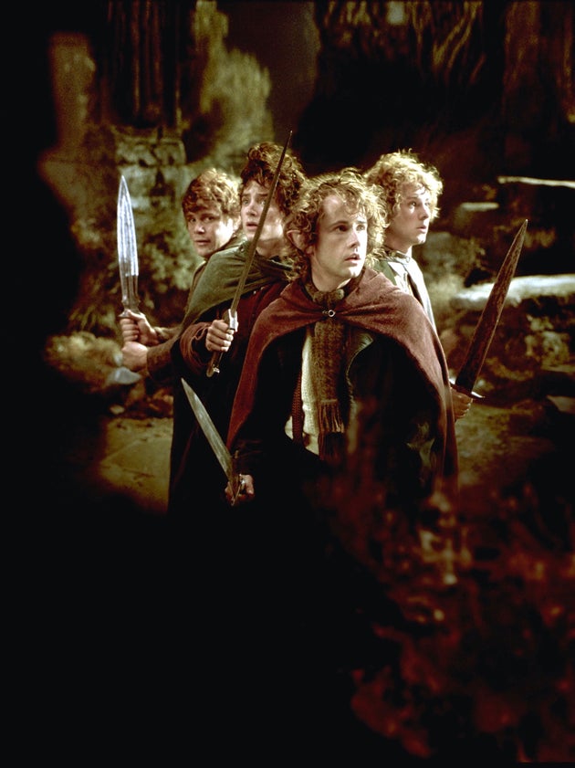 Sean Astin, Elijah Wood, Billy Boyd, and Dominic Monaghan on the set of The Lord Of The Rings: The Fellowship Of The Ring