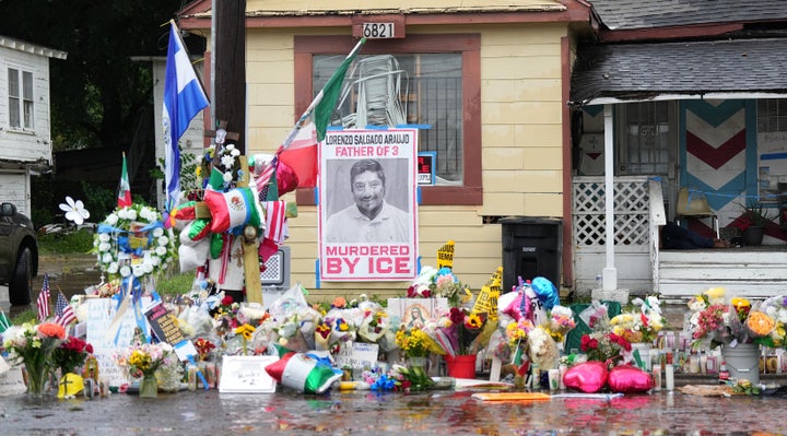A growing memorial at the site where Lorenzo Salgado Araujo was fatally shot by ICE agents last week is seen Monday in Houston.