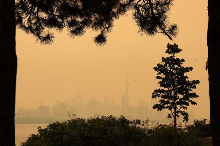 The view of the smoke from Northern Ontario forest fires that has the City of Toronto skyline shrouded in haze as viewed from Humber Park West in Toronto on July 15, 2026. Steve Russell/Toronto Star (Steve Russell/Toronto Star via Getty Images)
