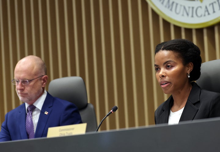 Federal Communications Commission Chairman Brendan Carr and Commissioner Olivia Trusty participate in an FCC meeting in Feb. 2026. Carr and Trusty are among seven FCC commissioners who have accepted Kennedy gala tickets from CBS or its parent company over the last decade. 