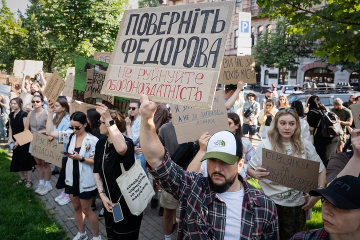 Ukranians gather to denounce President Volodymyr Zelenskyy's decision to dismiss Defense Minister Mykhailo Fedorov after six months in the post, Kyiv, Ukraine, on July 16, 2026. Placard reads: Bring back Fedorov. Do not destroy defense capability.