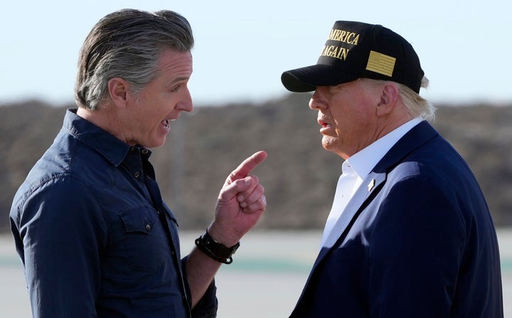 California Gov. Gavin Newsom speaks to President Donald Trump at Los Angeles International Airport on Jan. 24, 2025.