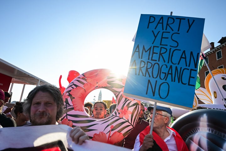 Demonstrators gather to protest against the visit of U.S. Ambassador to Italy Tilman Fertitta.
