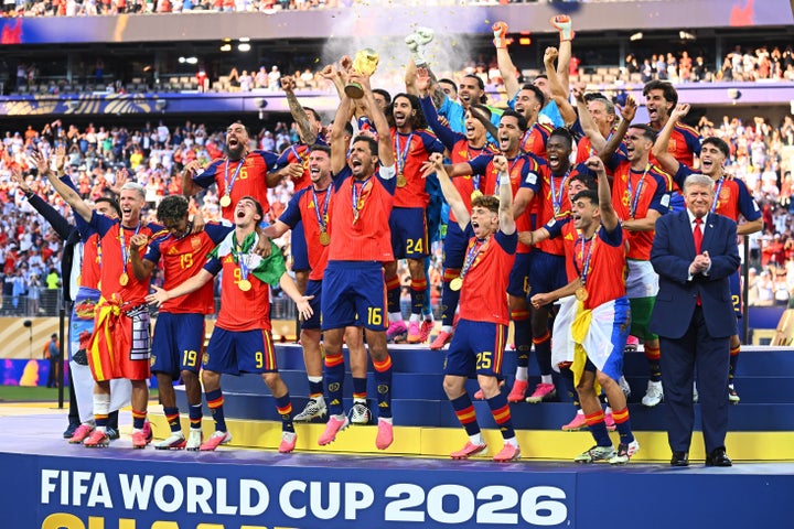Spain celebrates with the World Cup trophy ... and Trump.