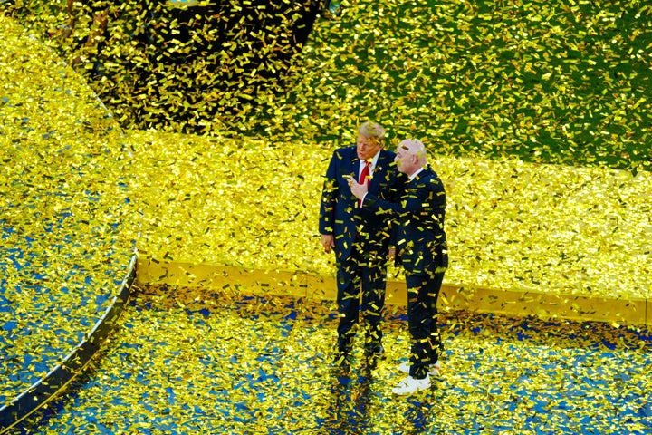 The photo that Javier Garcia shot for Shutterstock of Infantino and Trump speaking to the side after the trophy presentation.