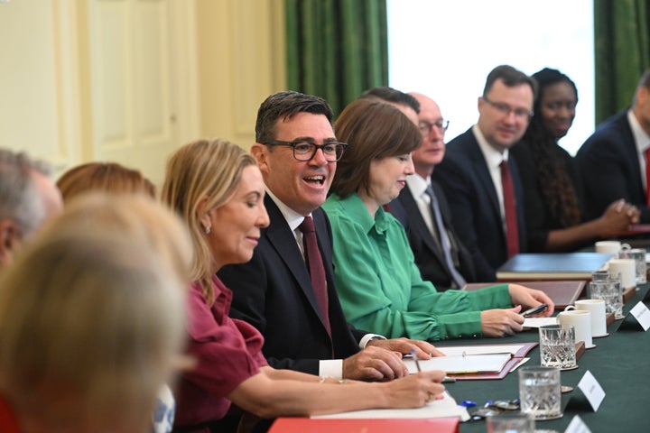 Britain's Prime Minister Andy Burnham, center, attends his first cabinet meeting as prime minister at 10 Downing Street, London, Tuesday July 21, 2026. 