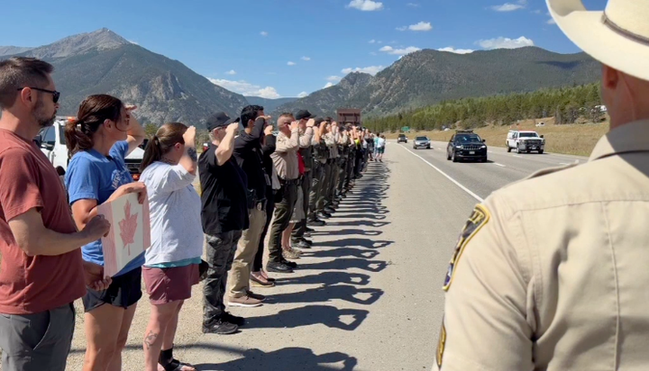 A funeral procession for Canadian firefighter Nicholas Dale passes through Summit County, Colorado, on July 20, 2026.