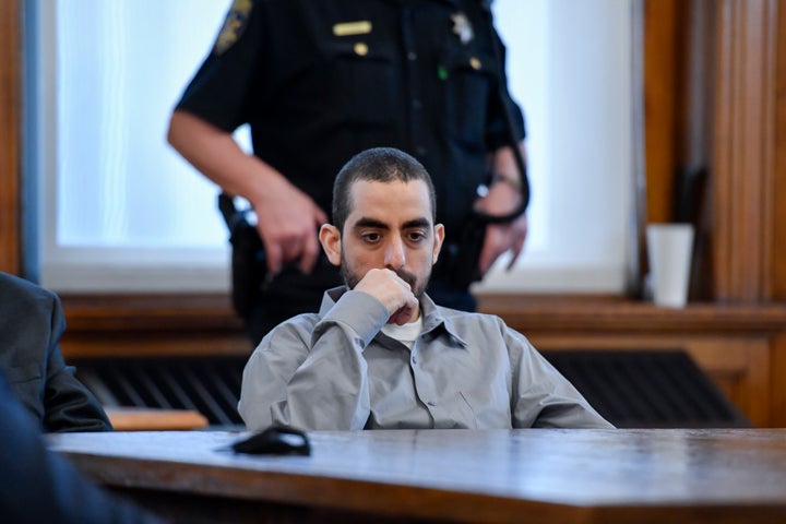Hadi Matar, charged with severely injuring author Salman Rushdie in a 2022 knife attack, waits in Chautauqua County court before the reading of the verdict in Mayville, N.Y., Friday, Feb. 21, 2025. (AP Photo/Adrian Kraus)