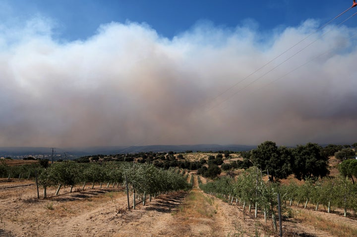Smoke from forest fires above the skyline in Villamanta, southwest of Madrid, the capital of Spain, on Friday, July 24, 2026. More than 200,000 people fled towns in central Spain and southern France overnight as wildfires moved closer to the cities of Madrid and Bordeaux. Photographer: Emilio P. Doiztua/Bloomberg via Getty Images