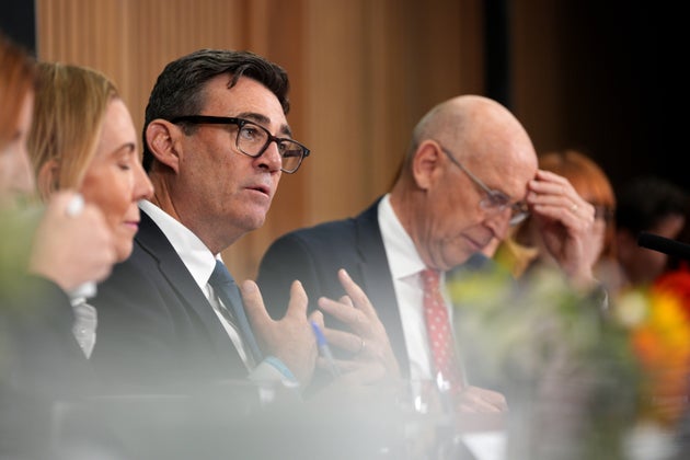Britain's Prime Minister Andy Burnham, center, holds a National Economic Council meeting at No 10 North at Heron House in Manchester, England. Friday July 24, 2026.