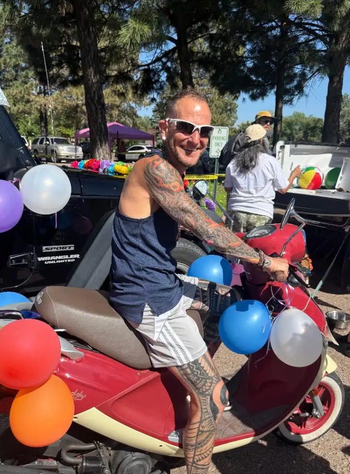 The author, age 54, at the Santa Fe Pride Parade.