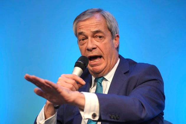 Reform UK leader Nigel Farage attends a press conference on the economy and renewable energy, in London, Wednesday, Feb. 12, 2025. 