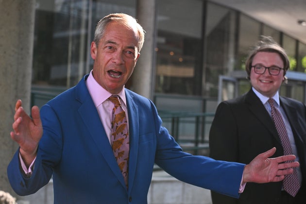 Britain's Reform UK leader Nigel Farage leaves Milbank Tower after he said he'll quit his Parliament seat and seek reelection in London, Tuesday, July 7, 2026.(AP Photo/Thomas Krych)