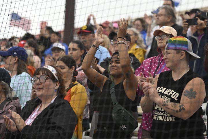 Fans cheer before the start of Saturday’s game. (AP Photo/Lexie Knight)