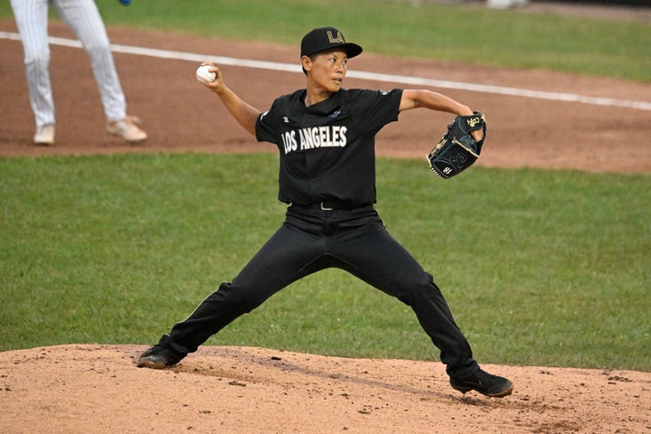 Los Angeles Queens' Ayami Sato pitches in the fourth inning. (AP Photo/Lexie Knight)