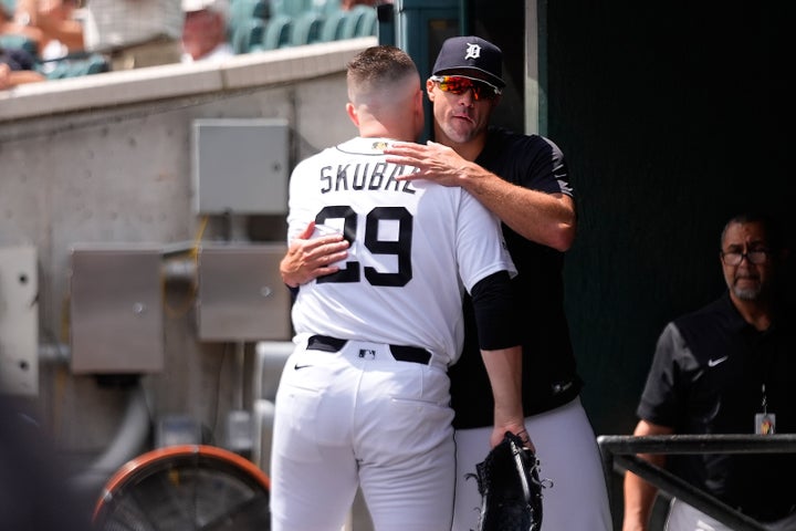 Detroit Tigers pitcher Tarik Skubal hugs Jack Flaherty in the dugout during the seventh inning of a baseball game against the Baltimore Orioles on Wednesday in Detroit. (AP Photo/Paul Sancya)