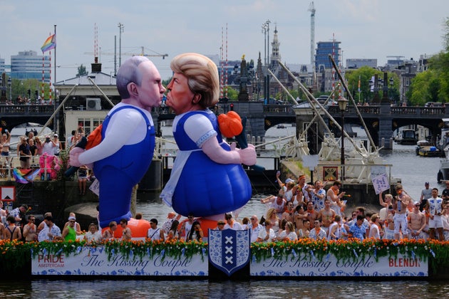 Trump and Putin inflatable “Kissing Couple” featured at Amsterdam WorldPride 2026 canal parade