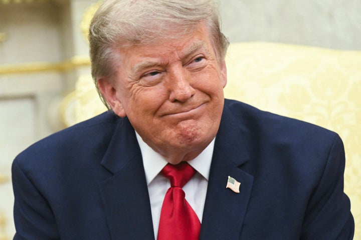 President Donald Trump looks on during a meeting with Prime Minister of Iraq Ali al-Zaidi in the Oval Office on July 14, 2026. 